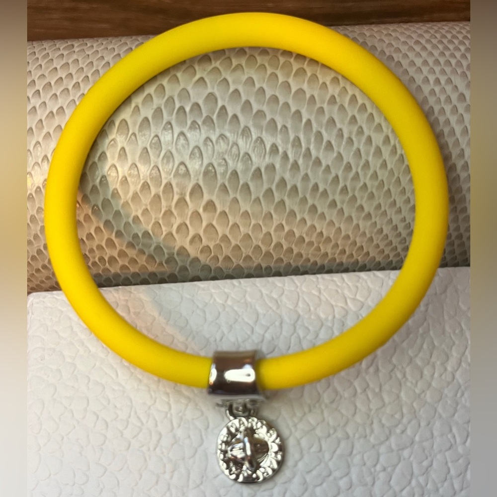 NWOT Marc Jacob’s rubber bangle bracelet Yellow with silver charm